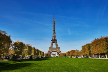 Scenic view of the Eiffel tower over blue sky