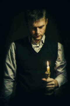 Man with a candle
