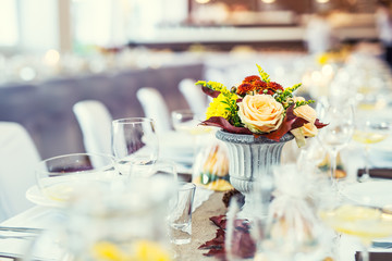 Wedding table. Flowers arrangement bouquets as decoration for wedding.
