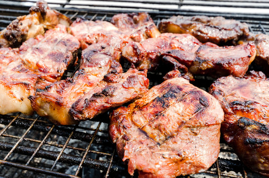 Pork roast on charcoal grill