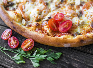 Pizza and ingredients with low depth of field