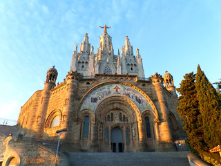 Fototapeta na wymiar Church of the Sacred Heart in the evening sunlight, Tibidabo mountain top in Barcelona, Spain