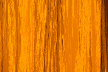 Orange curtain made of crinkled satin