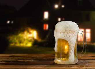 cold mug of beer in a landscape