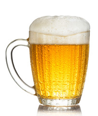 cold mug of beer with foam isolated on white background