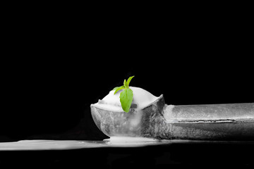 ice cream scoop melting. business gradually fall concept on red wood background.