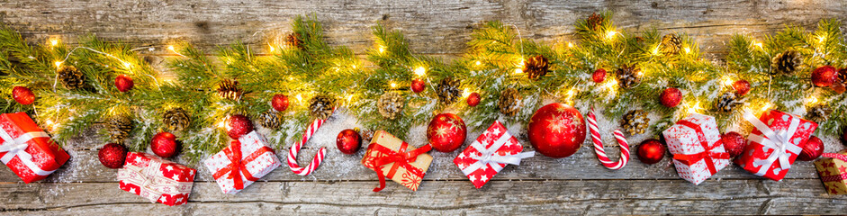 Christmas gifts with decoration on wood