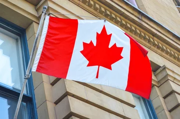 Fotobehang Waving Canadian flag in Ottawa  © bakerjarvis