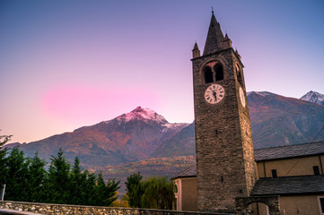 Fototapeta na wymiar church bell tower, autumn colors during the sunset