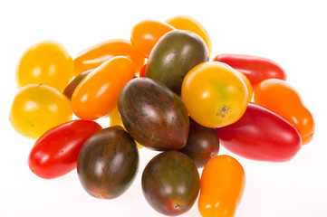 colored tomatoes on a pure white background