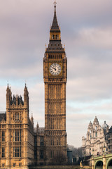 Fototapeta na wymiar Big Ben portrait style centre position with part Houses of Parliament