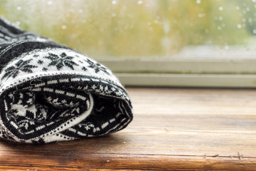 Winter warm knitted sweater with traditional Swedish ornament and dried lavender