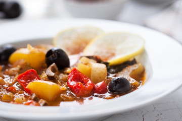 Italian seasonal vegetable soup in a restaurant, closeup, horizontal