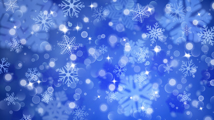 Christmas background of fuzzy and focused snowflakes