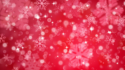 Christmas background of fuzzy and focused snowflakes