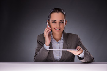 Woman with tablet computer in business concept
