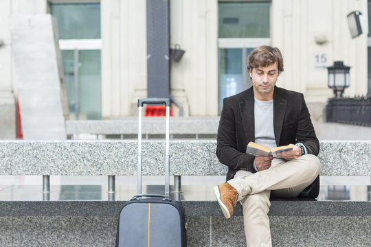 Man waiting at train station