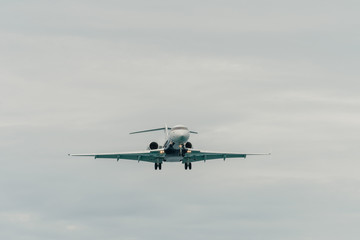 Aircraft landing in cloudy day