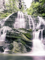 Moss Glen Waterfall in Vermont shot at the beginning of autumn