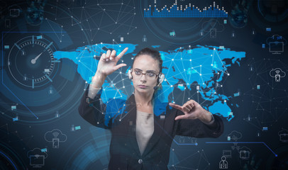 Woman pressing virtual buttons in futuristic concept