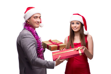 Pair celebrating christmas in the office isolated on white