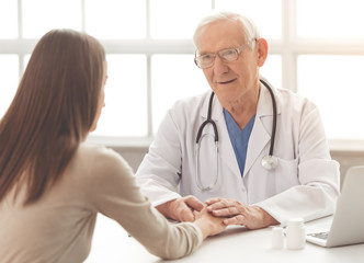 Old doctor and patient