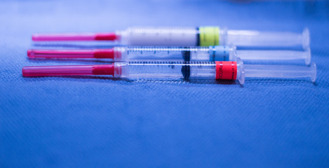 Three Syringes Containing Anesthesia Drugs 