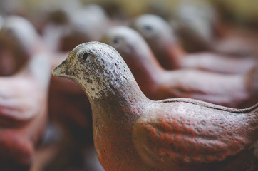 Wooden Painted Birds in a Row