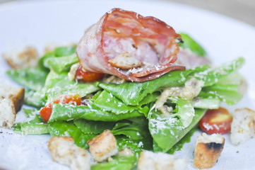 Caesar salad or salad with cos lettuce and ham