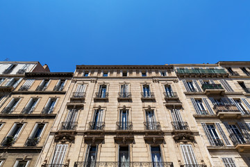 Fototapeta premium Typical French buildings in Marseille, France on a spring day. 