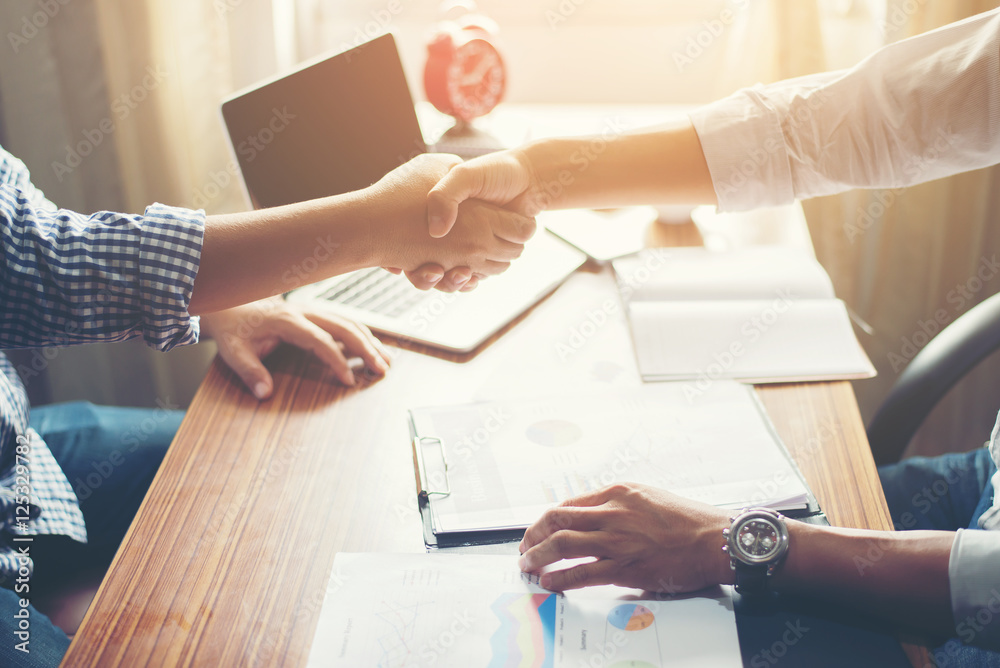 Wall mural Business People Handshake Greeting Deal at work.