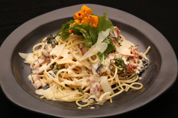 Pasta carbonara. Spaghetti with bacon and parmesan cheese 