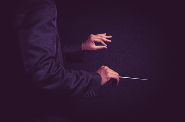 Orchestra conductor hands, Musician director holding stick on da