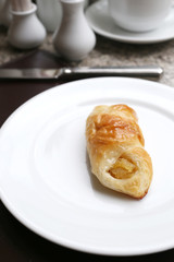 dessert baked or fruit bread on white dish.