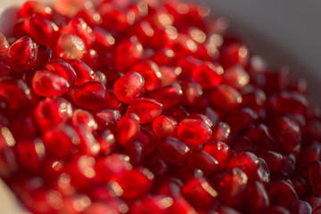 Fresh ripe pomegranate. Macro with shallow depth of field.
