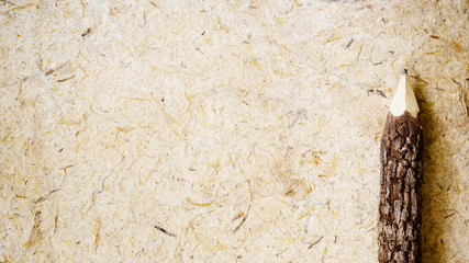 Wooden Pencils on mulberry paper with copy space