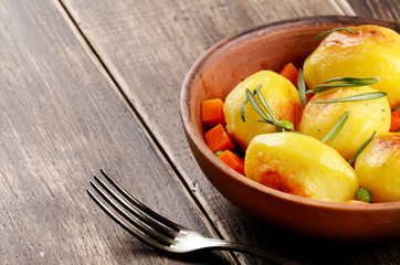 Boiled and baked potato and vegetables