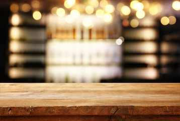 table in front of abstract blurred restaurant lights