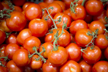 Bulk of red tomatos on the market