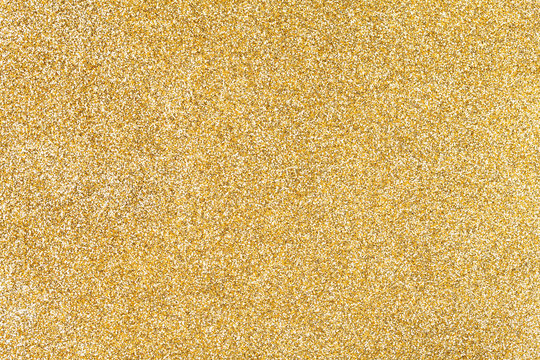 Golden sparkling background from small sequins.