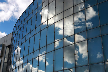 sky reflected in office building