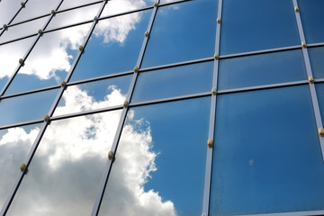 sky reflected in office building