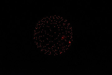 Holiday fireworks of colored lights isolated on black background