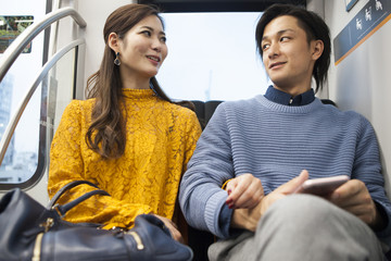 The couple are talking about sitting on a train