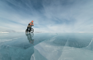Girl on a bmx on ice.