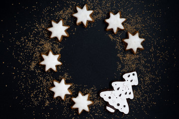 black background with figured gingerbread and brown sugar