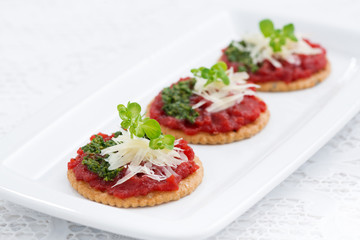 crackers with beetroot pate and pesto