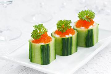 cucumber tartlets with cream cheese and red caviar