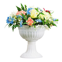 Colorful flower bouquet arrangement centerpiece in vase isolated on white background. Closeup.