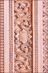 Pattern of flower carved on wood background